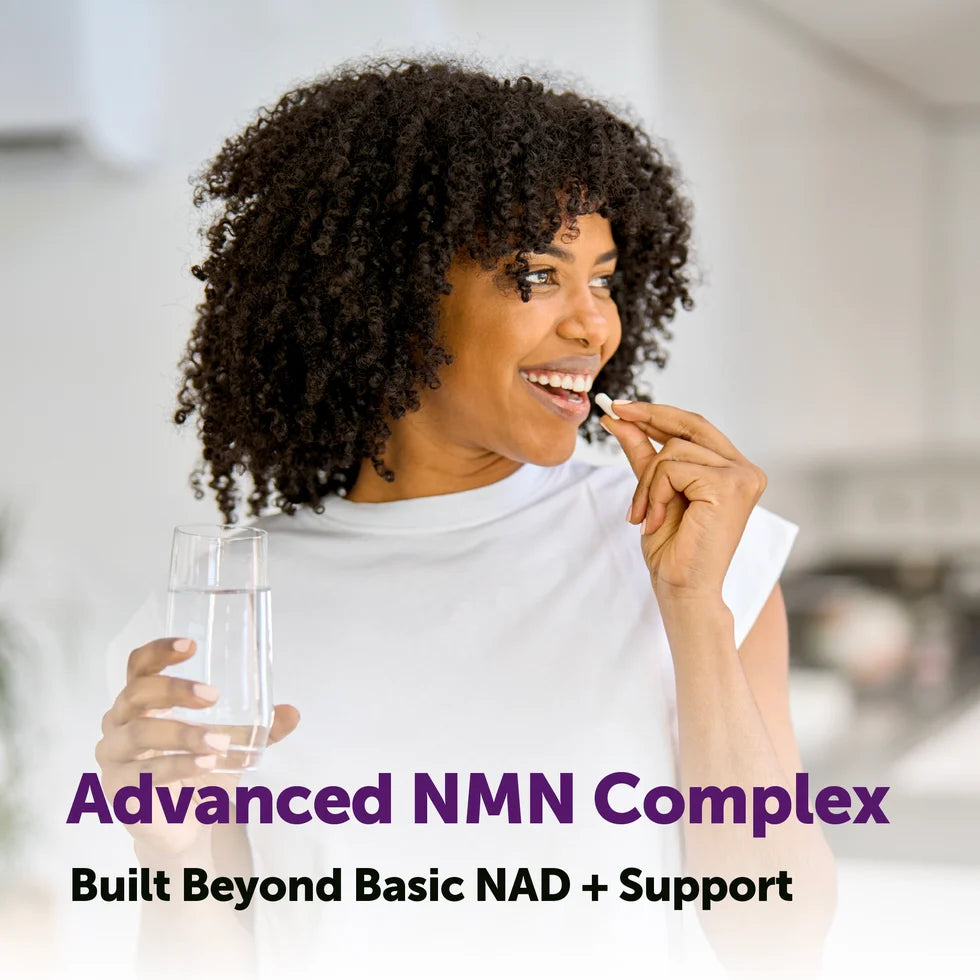 Woman taking an NMN capsule with a glass of water. Advanced NMN Complex, built beyond basic NAD+ support